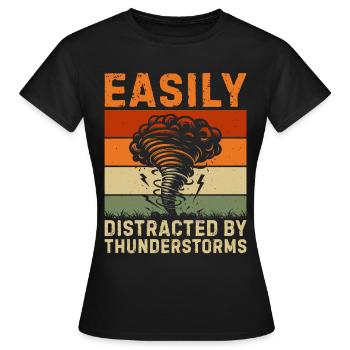 Easily distracted by thunderstorms - Women's T-Shirt - black - Front - AI Model Female 172 dark (172cm)