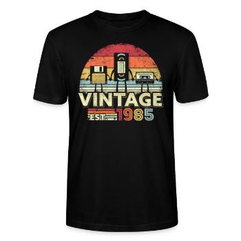 1985 Drucken. Vintage Geburtstagsgeschenk, lustige Musik, - Stanley/Stella Unisex Bio-T-Shirt CRAFTER - Schwarz - Vorne - Alina (178cm) & Michal (187cm)