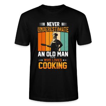 Ne sous-estimez jamais un vieil homme qui cuisine - T-shirt bio CRAFTER Stanley Stella Unisexe - noir - Devant - Alina (178cm) & Michal (187cm)