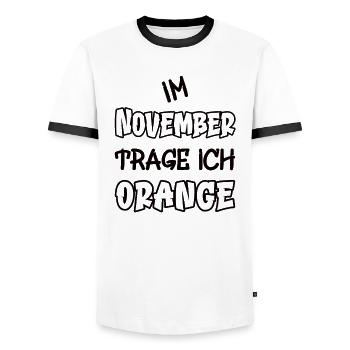 En novembre, je porte de l’orange en disant couleur orange - T-shirt contrasté Homme - blanc/noir - Devant - AI Model Female 172 light (172cm) & AI Model Male 178 dark (178cm)