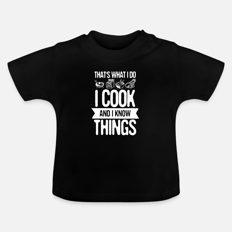 C'est ce que je fais Je cuisine et je sais des cadeaux - T-shirt bio col rond Bébé - noir