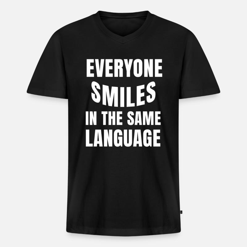 Smiling connects statement humanity - Men's Premium Organic T-shirt with V-neck - black