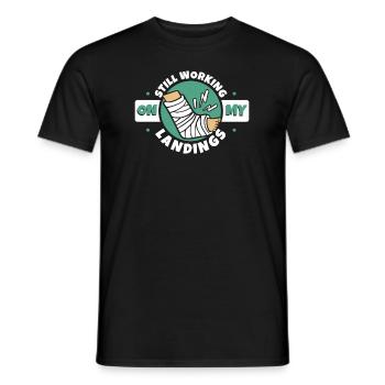 Ich arbeite immer noch an meinen Landungen, gebrochener Fingerknochen - Männer T-Shirt - Schwarz - Vorne - AI Model Male 178 light (178cm)
