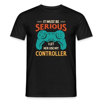 IT MUST BE SERIOUS I LET HER USE MY CONTROLLER - Men's T-Shirt - black - Front - AI Model Male 178 light (178cm)