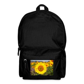 Sonnenblumen Blütenkopf ragt aus einem Feld hervor - Rucksack - Schwarz - Vorne