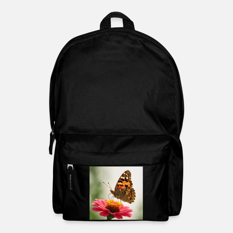 Schmetterling auf einer rosa Blume - Rucksack - Schwarz