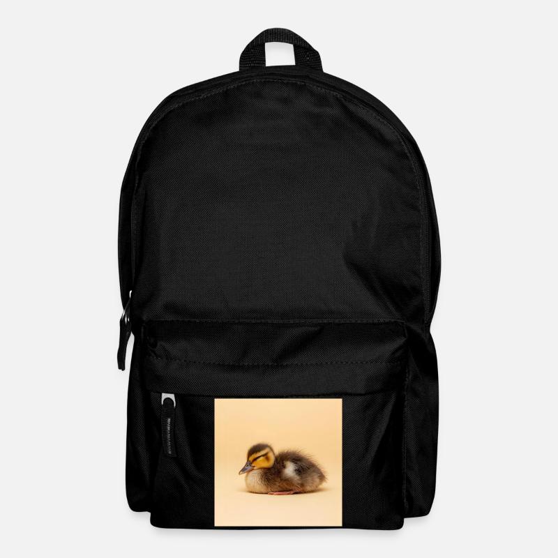 Goldenes Küken auf cremefarbenem Hintergrund - Rucksack - Schwarz