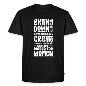 We create a more equitable and just world for - Men's Premium Organic T-Shirt - black - Front - Nico (187cm)