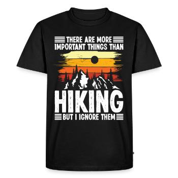 Il y a des choses plus importantes que - T-shirt Premium bio Homme - noir - Devant - Nico (187cm)