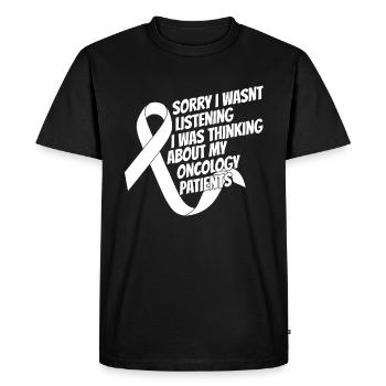 Infirmière en oncologie - T-shirt Premium bio Homme - noir - Devant - Nico (187cm)