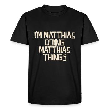 Je suis Matthias en train de faire des choses Matthias - T-shirt Premium bio Homme - noir - Devant - Nico (187cm)