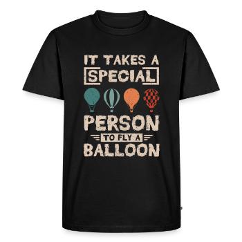 Il faut une personne spéciale pour piloter un ballon - T-shirt Premium bio Homme - noir - Devant - Nico (187cm)