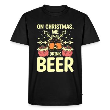 On christmas we drink beer - Men's Premium Organic T-Shirt - black - Front - Nico (187cm)