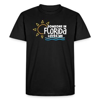 Quelqu’un en Floride m’aime - T-shirt Premium bio Homme - noir - Devant - Nico (187cm)