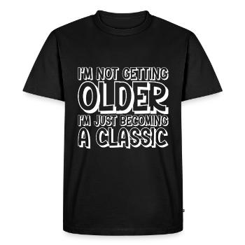 Je ne vieillis pas, je deviens juste un classique - T-shirt Premium bio Homme - noir - Devant - Nico (187cm)