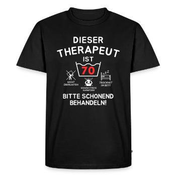 Ce thérapeute a 70 ans. - T-shirt Premium bio Homme - noir - Devant - Nico (187cm)