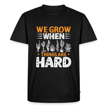 Nous grandissons quand les choses sont difficiles - T-shirt Premium bio Homme - noir - Devant - Nico (187cm)