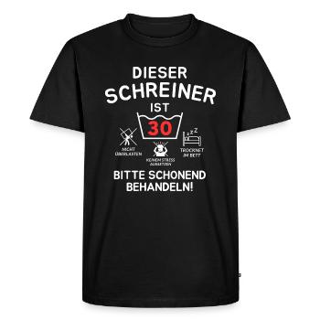 This carpenter is 30 years old. - Men's Premium Organic T-Shirt - black - Front - Nico (187cm)