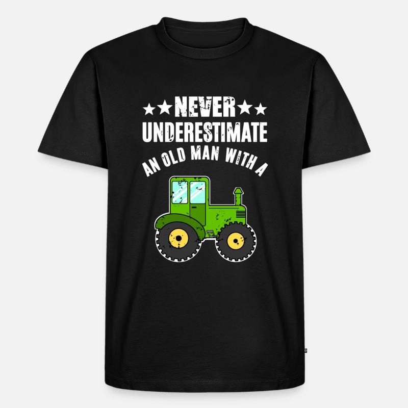 Never Underestimate Traktor - Männer Premium Bio T-Shirt - Schwarz