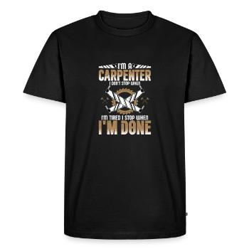 Carpenter's Determination - Done Trumps Tired - Men's Premium Organic T-Shirt - black - Front - Nico (187cm)