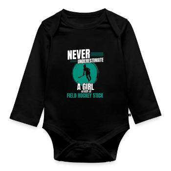 Une fille avec un bâton de hockey sur gazon marque un but sportif - Body Bébé bio manches longues - noir - Devant