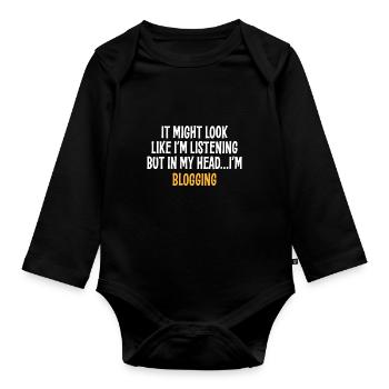 J’AI PEUT-ÊTRE L’IMPRESSION D’ÉCOUTER, MAIS DANS MA TÊTE, JE SUIS - Body Bébé bio manches longues - noir - Devant