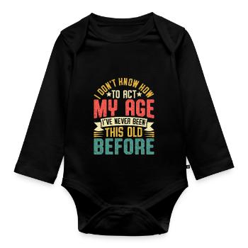 Humorous saying about age and experience - Organic Longsleeve Baby Bodysuit - black - Front
