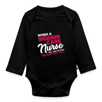 When a wound care nurse tell stay still you MUST - Organic Longsleeve Baby Bodysuit - black - Front