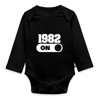 1982 - Organic Longsleeve Baby Bodysuit - black - Front