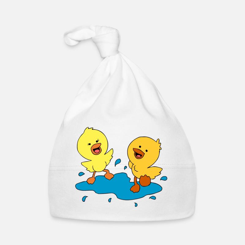 canetons doux éclaboussures dans une flaque d'eau Bonnet bio Bébé