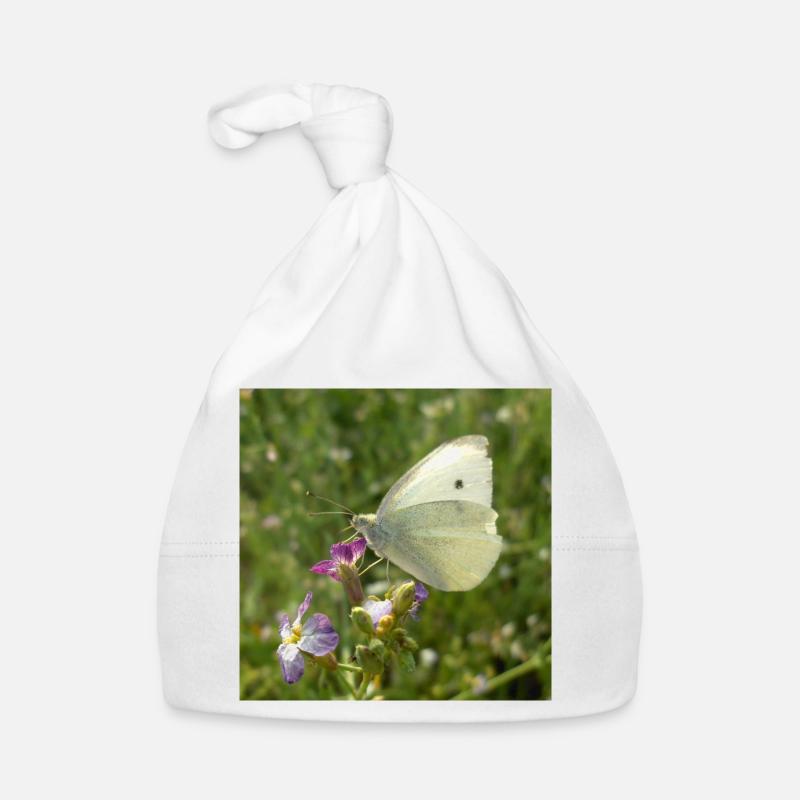 Papillon blanc sur fleur rose Bonnet bio Bébé
