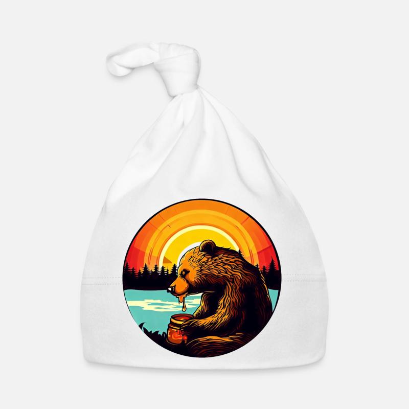 L’ours mange du miel au coucher du soleil Bonnet bio Bébé