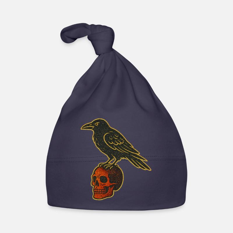 Corbeau sur crâne en aspect doré Bonnet bio Bébé
