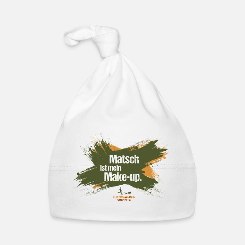 La boue, c’est mon maquillage. Bonnet bio Bébé