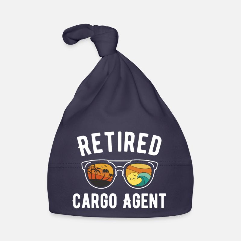 Look de vacances à la plage de l’agent à la retraite Bonnet bio Bébé