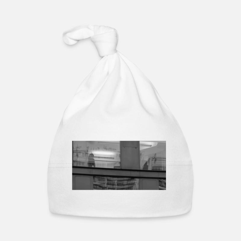 Caché derrière une vitre Bonnet bio Bébé