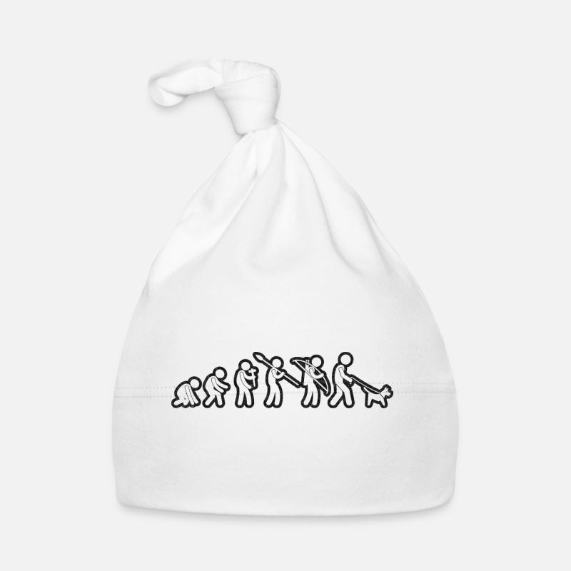 Evolution de l’homme marchant sur le grunge blanc Bonnet bio Bébé