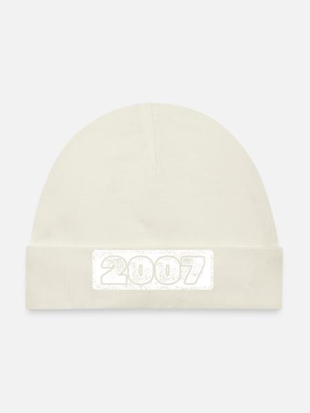 Année 2007 - Bonnet bio Bébé - blanc - Devant