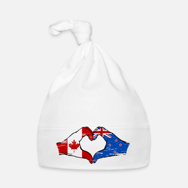 Mains du drapeau du Canada de la Nouvelle-Zélande en forme de coeur utilisé Bonnet bio Bébé