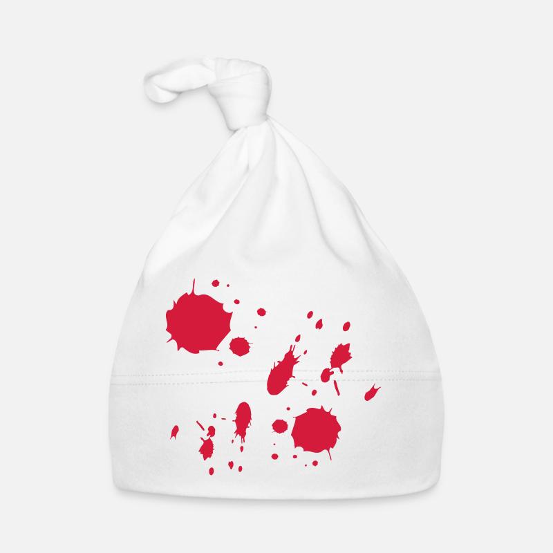 La peinture rouge éclabousse un motif abstrait Bonnet bio Bébé