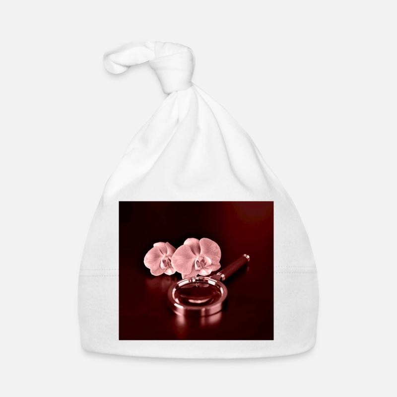 Fleurs d’orchidée et loupe Bonnet bio Bébé