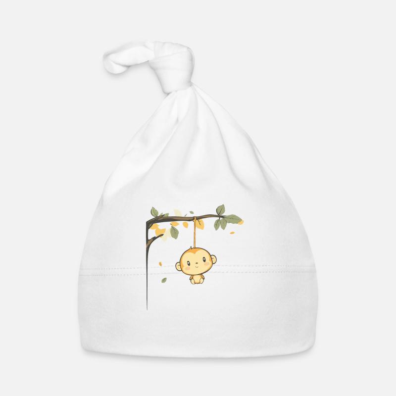 Singe mignon suspendu à un arbre et grimpant Bonnet bio Bébé