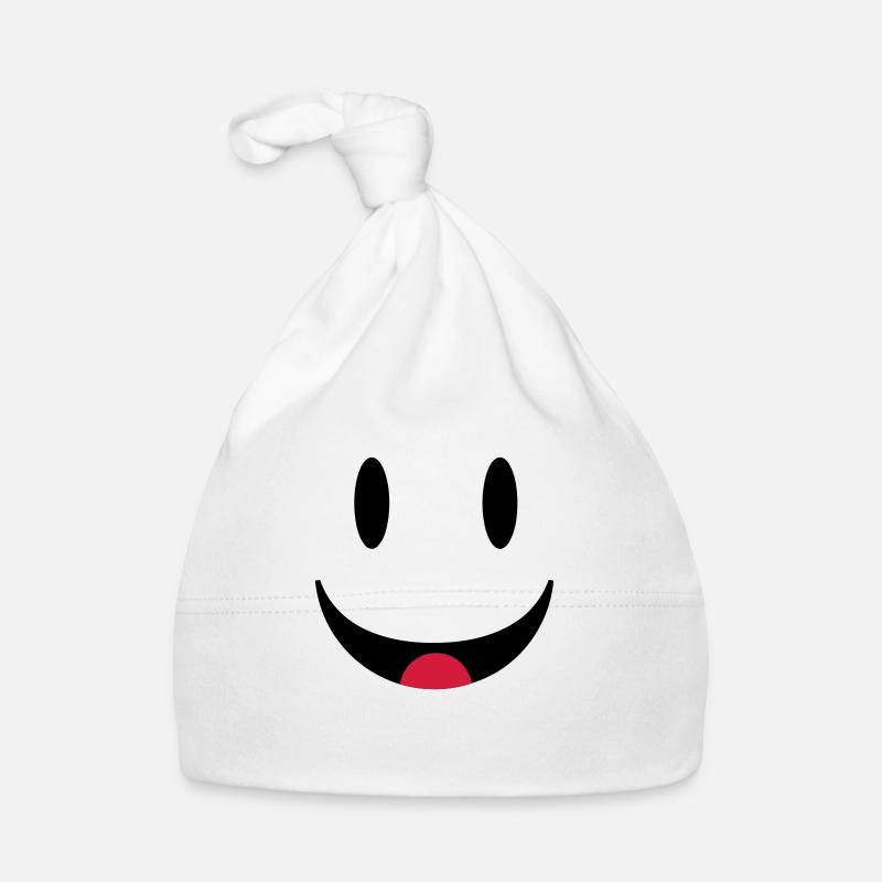 Visage souriant heureux avec la langue Bonnet bio Bébé