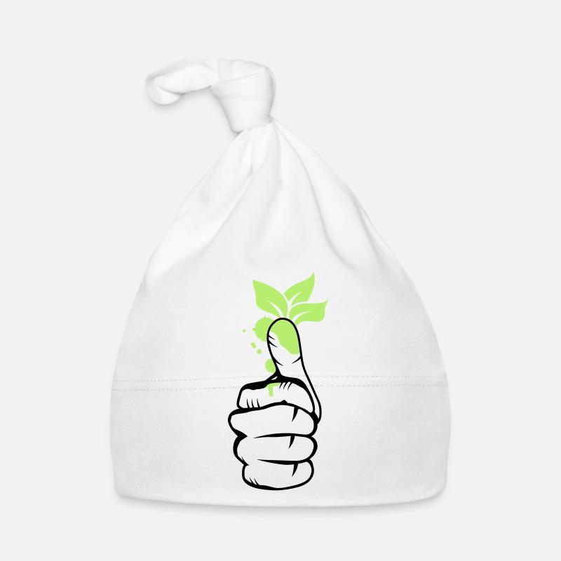 Une main avec des feuilles vertes sur le pouce Bonnet bio Bébé