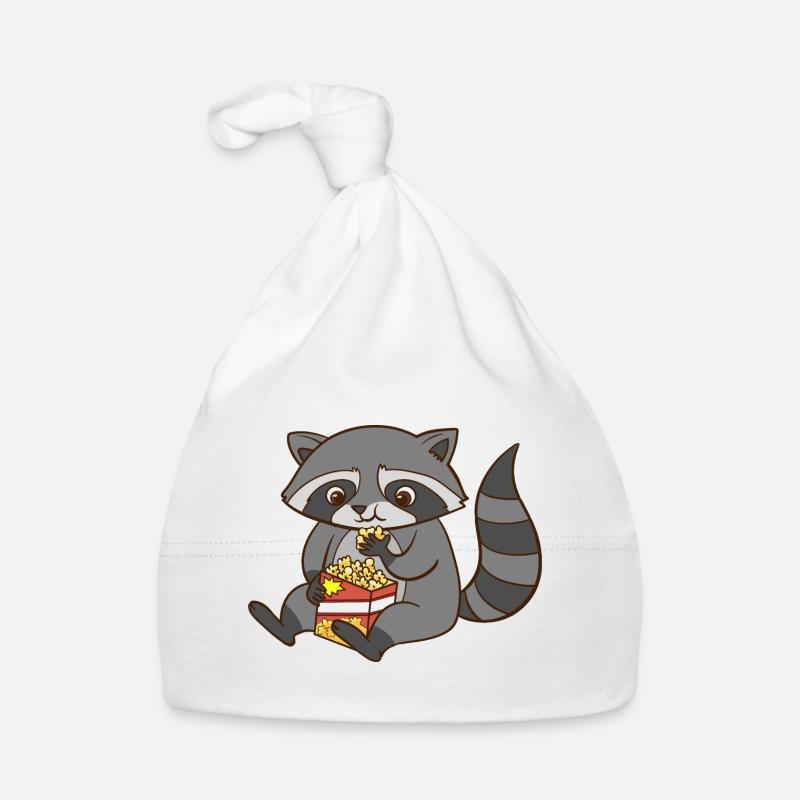 A cute raccoon eats popcorn. Organic Baby Cap