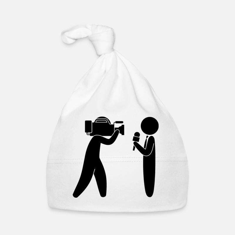 Reporter parle devant la caméra Bonnet bio Bébé
