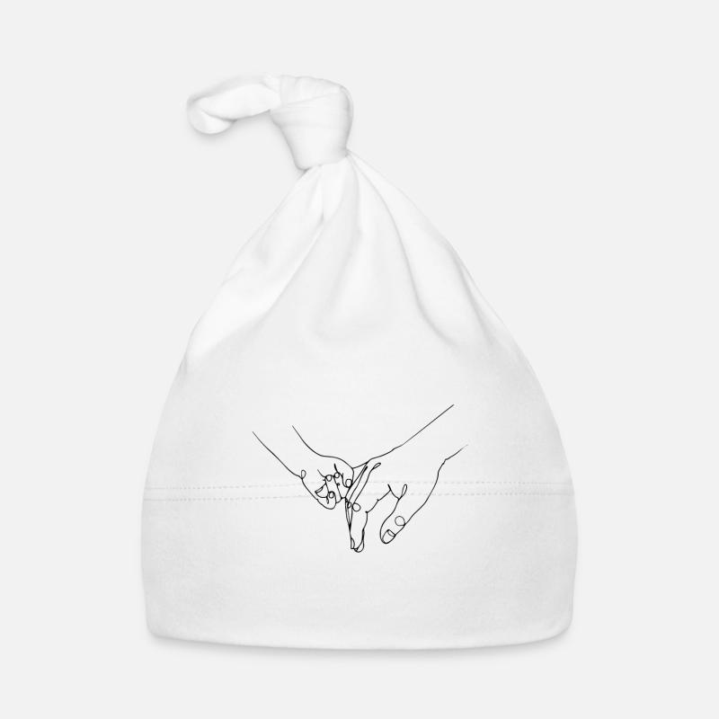 Bébé tenant la main Bonnet bio Bébé