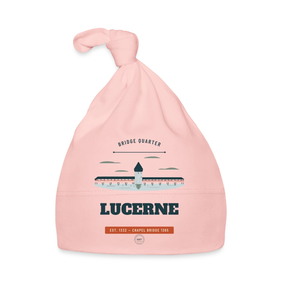 Lucerne badge on a organic baby cap, pink