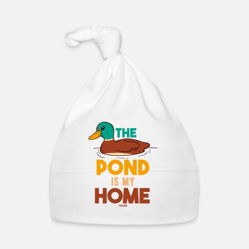 Le canard nage dans l’étang Oiseau canard Bonnet bio Bébé