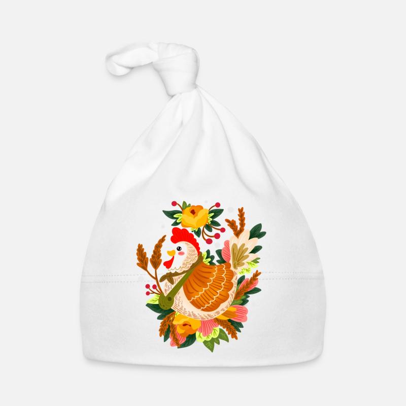 Une mère poule fait éclore des œufs d’élevage de poulets Bonnet bio Bébé